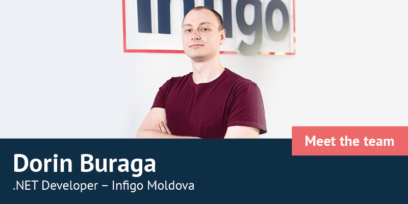 Dorin Buraga standing in front of Infigo logo