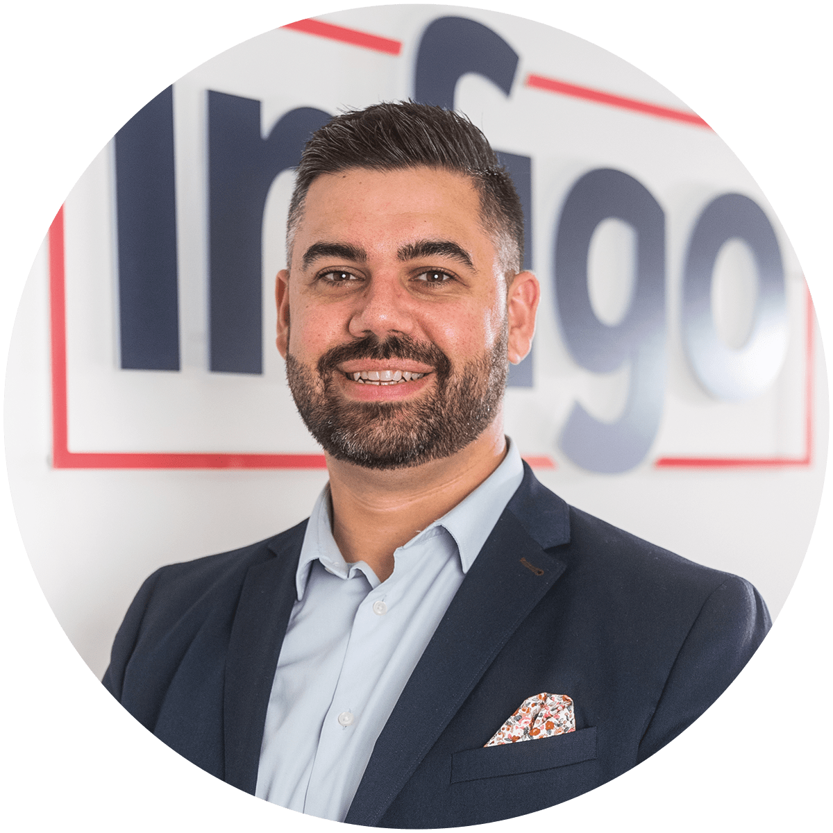 Greg Young in Front of Infigo Logo