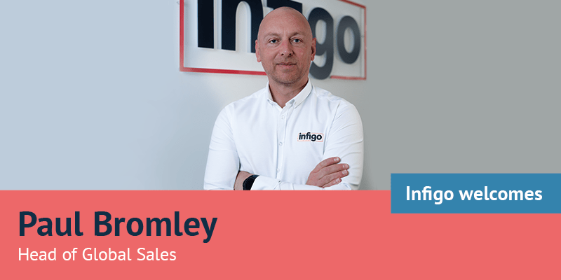 Paul Bromley in front of Infigo Logo