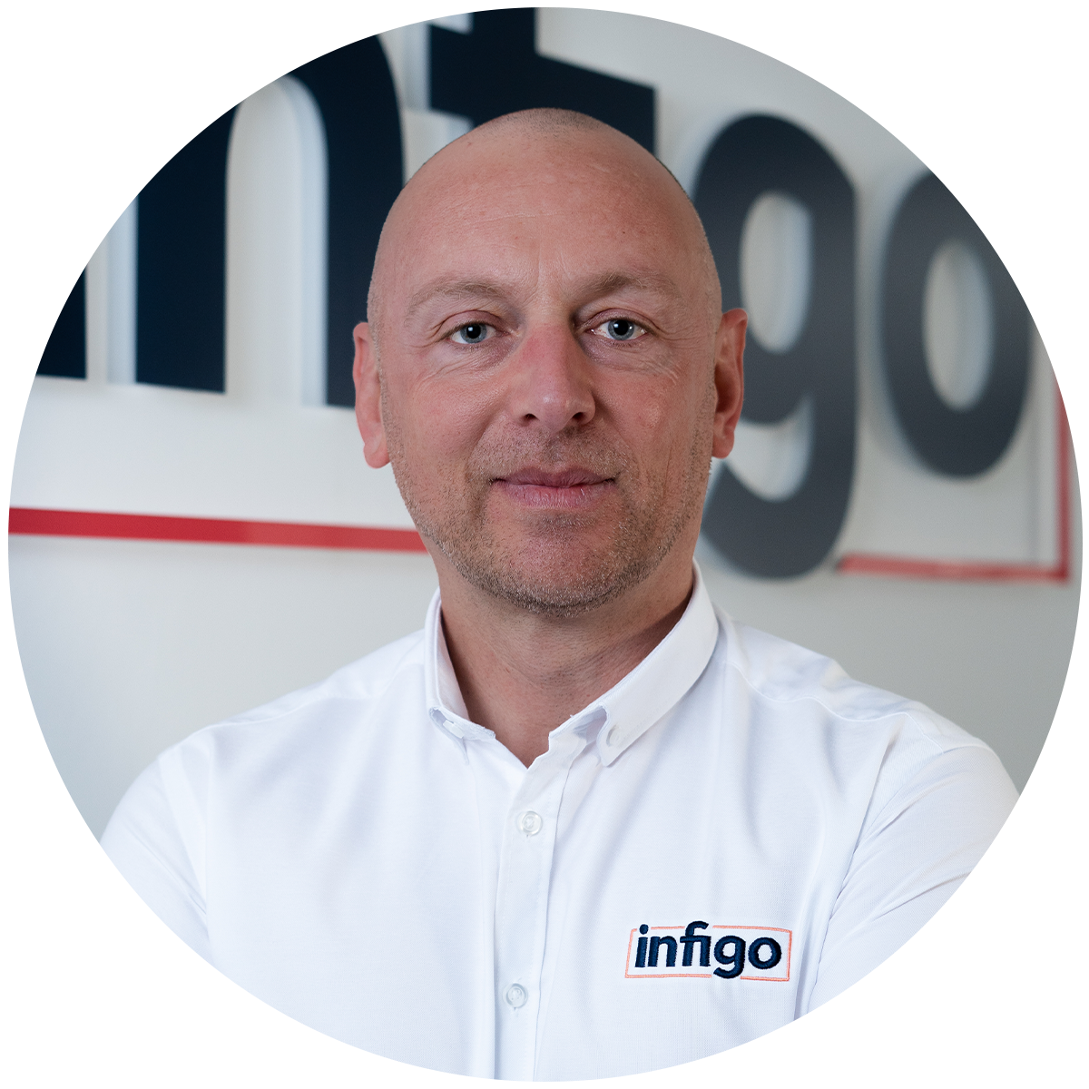 Paul Bromley in front of Infigo logo