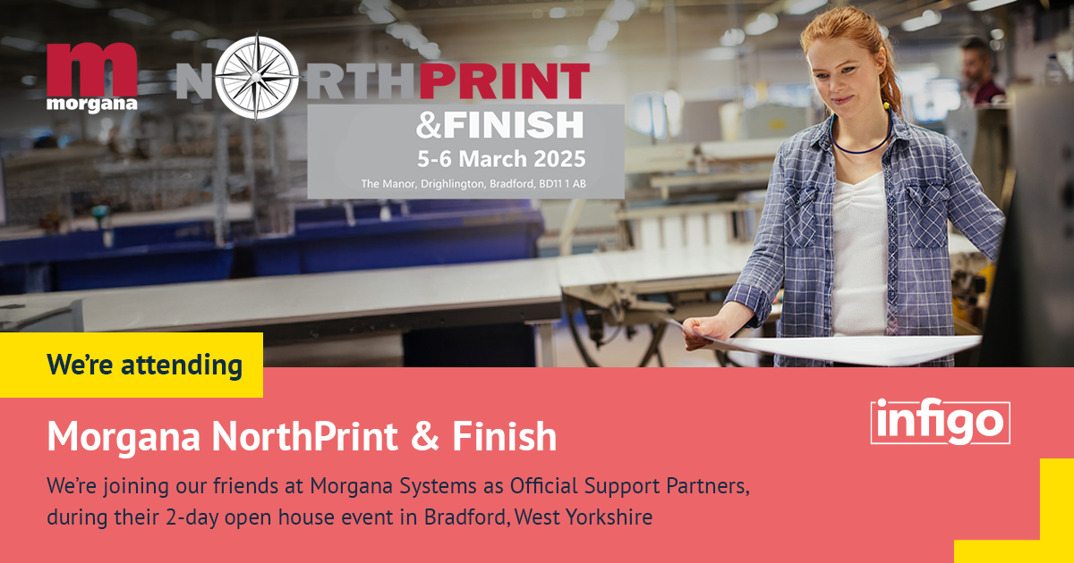 Woman in print factory holding print materials