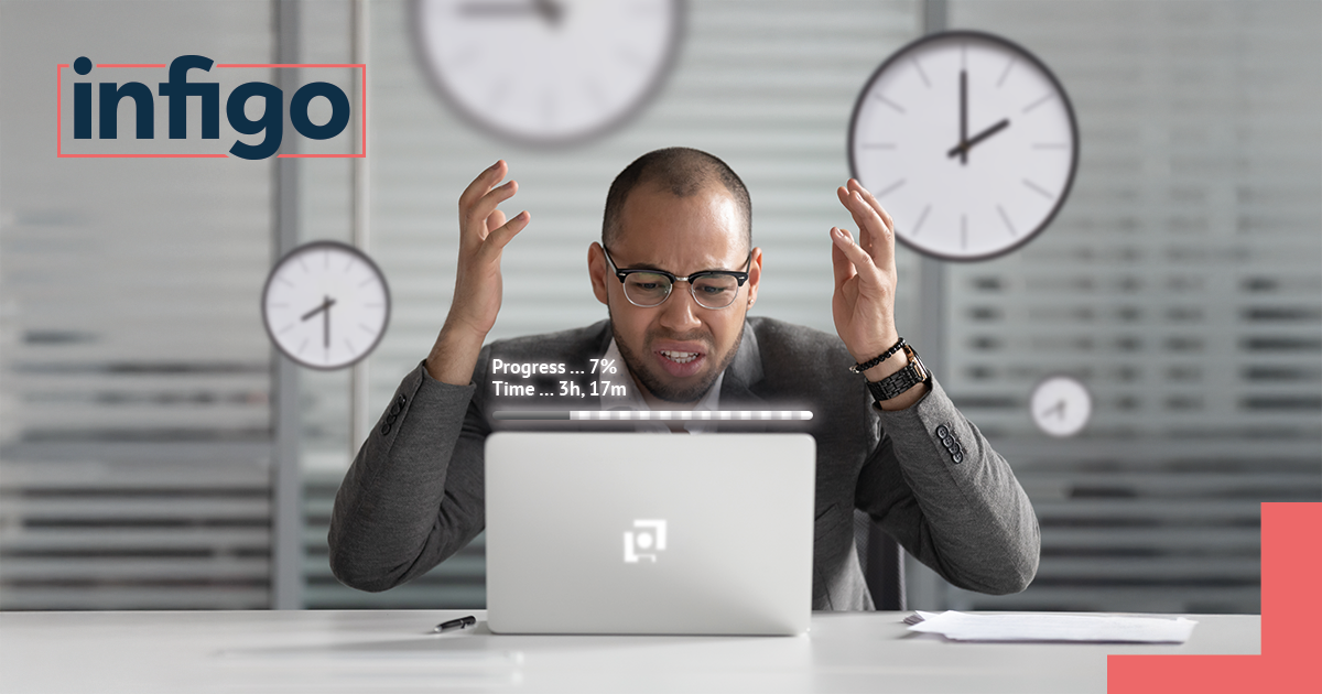 Man Frustrated at Computer with Slow Progress Bar