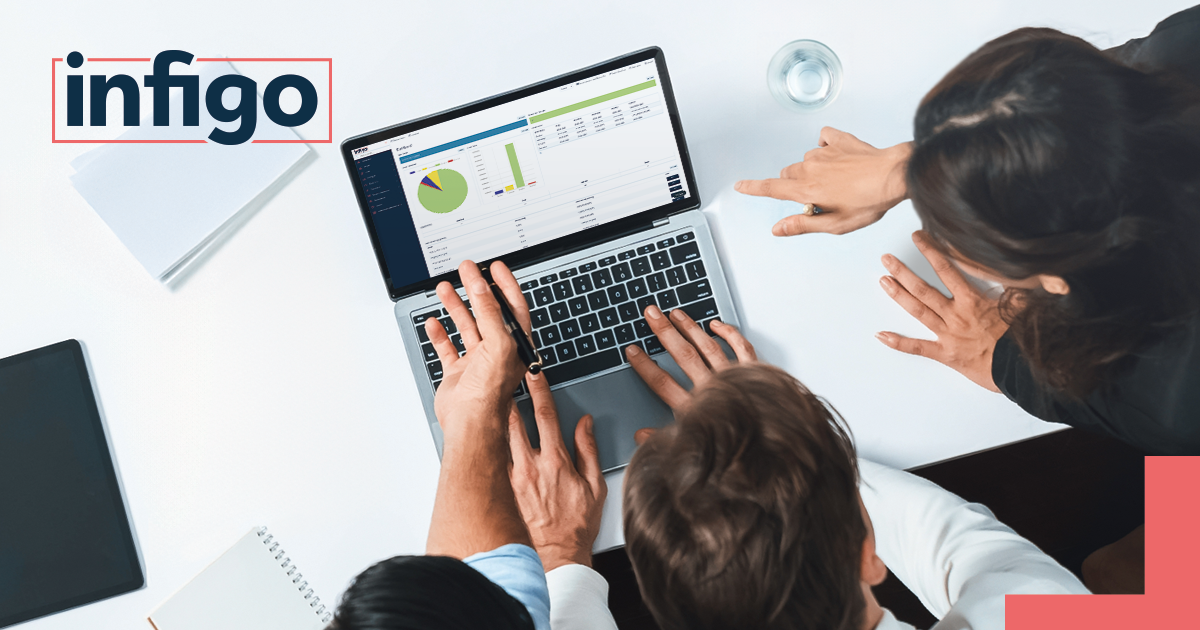 Group of employees working together on a laptop