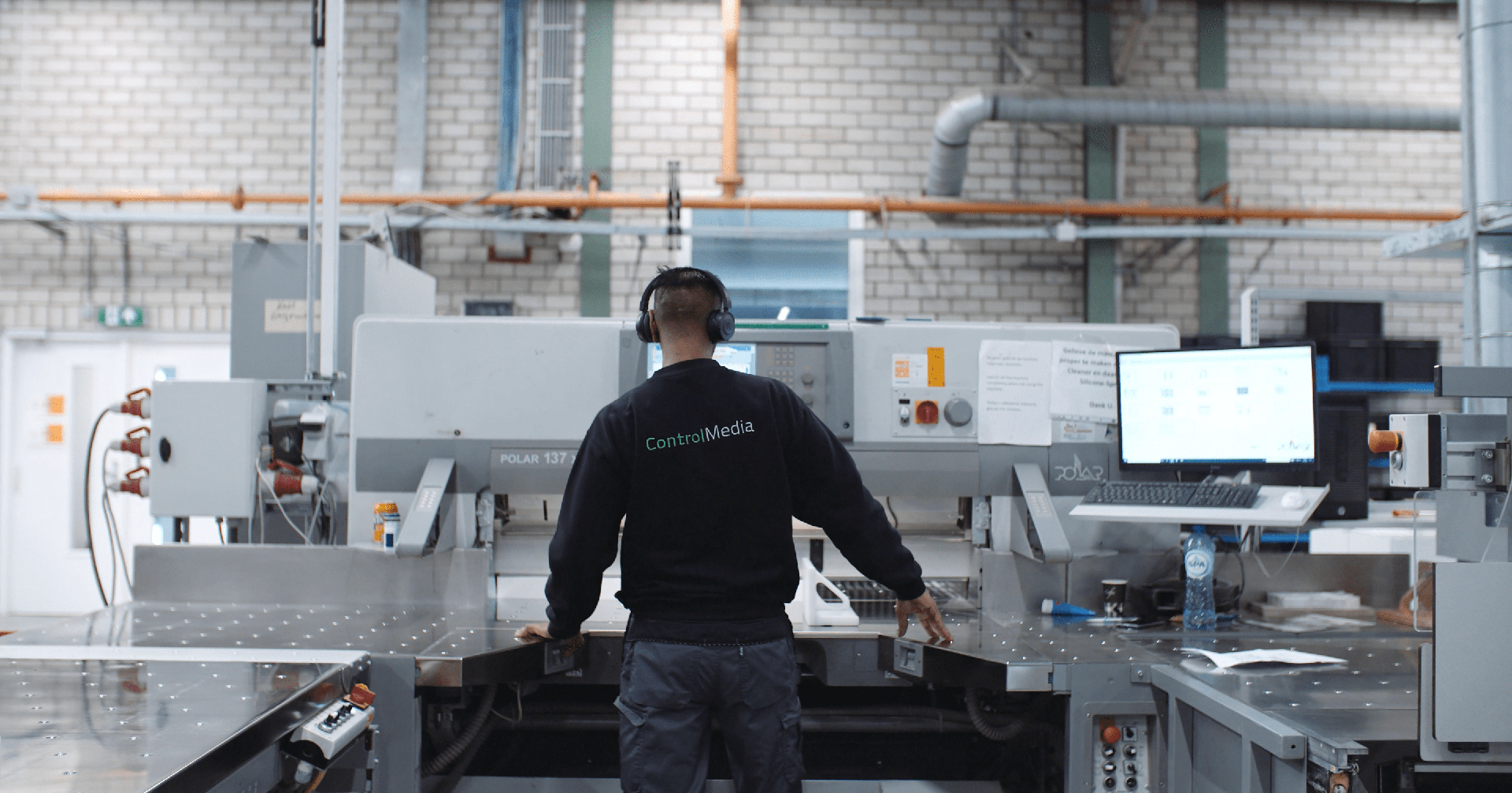 Control Media Employee with Machinery